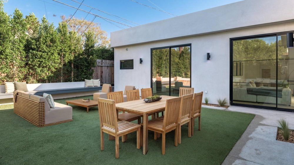 Covered patio and indoor-outdoor dining at The Gonzaga Residence, which includes a permitted attached ADU