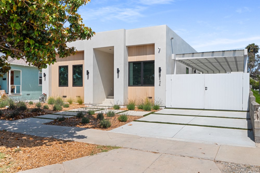 The Gonzaga Residence — street elevation with carport and gated entry