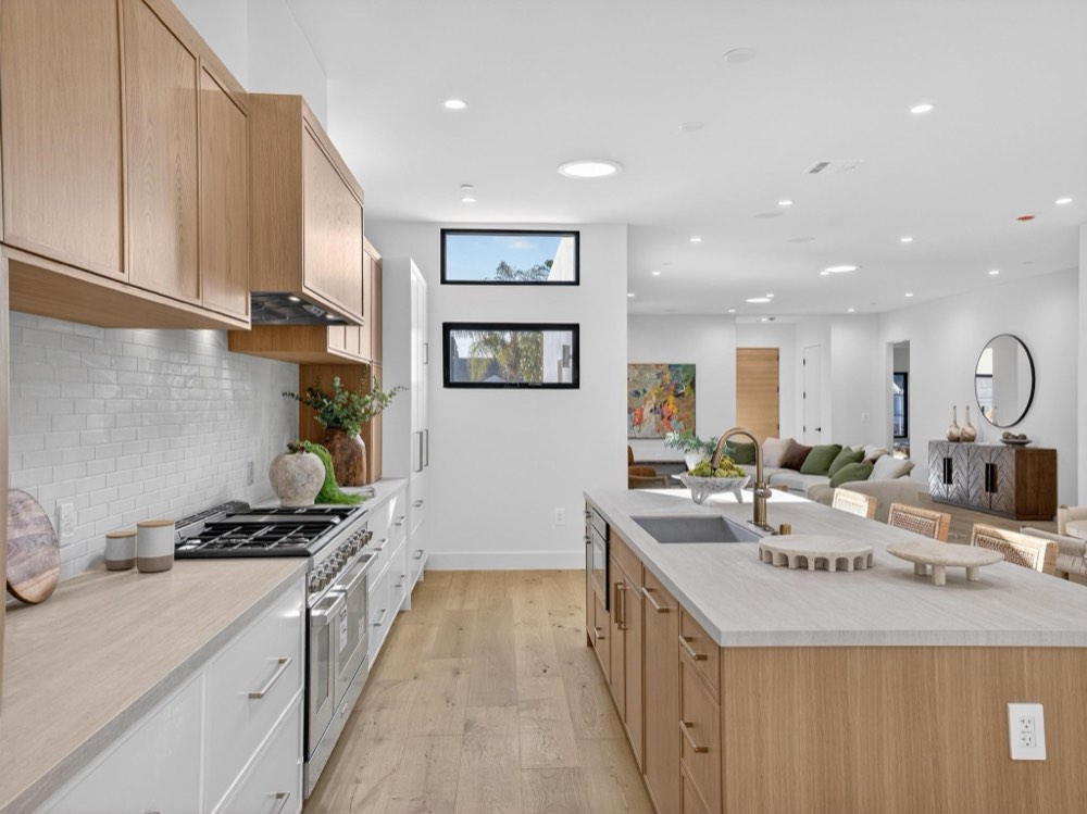 The Gonzaga Residence — chef's kitchen with oversized island